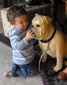 A toddler proves that dogs are man - and boys - best friends
