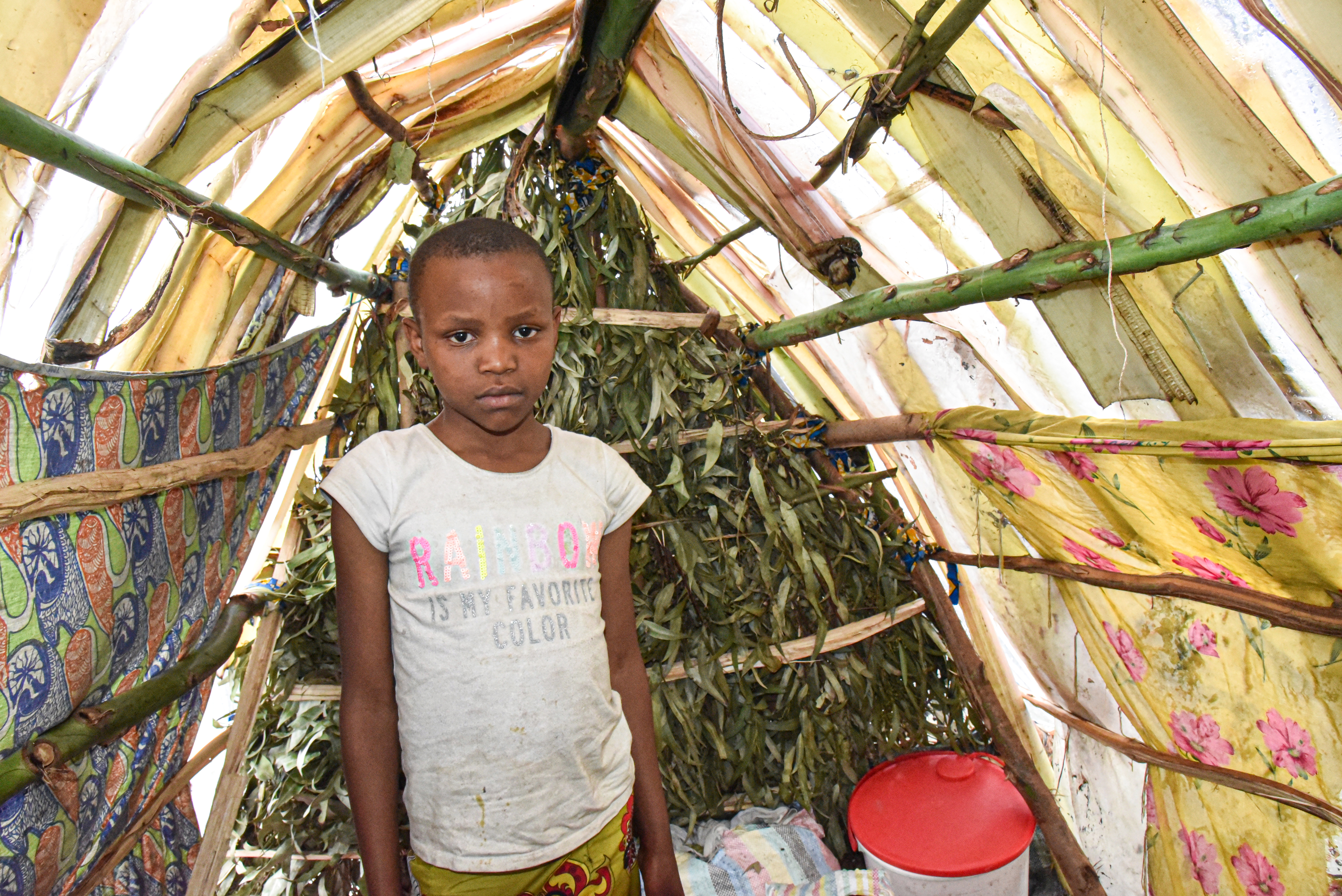 Girl from DRC pictured in a refugee shelter