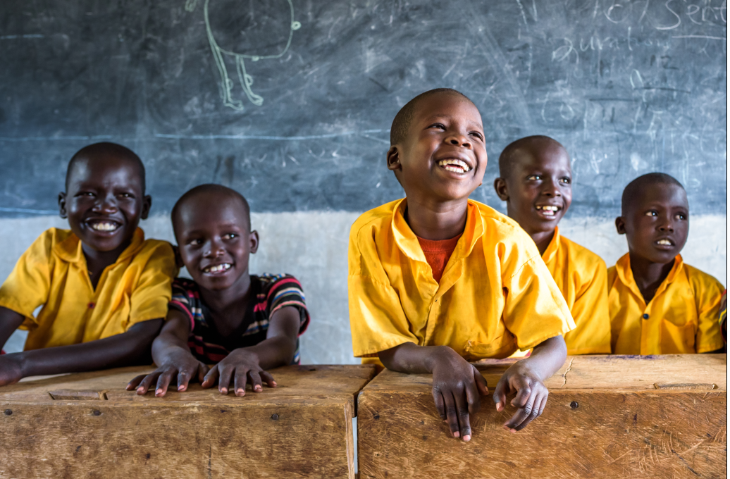 School children smiling in a class 