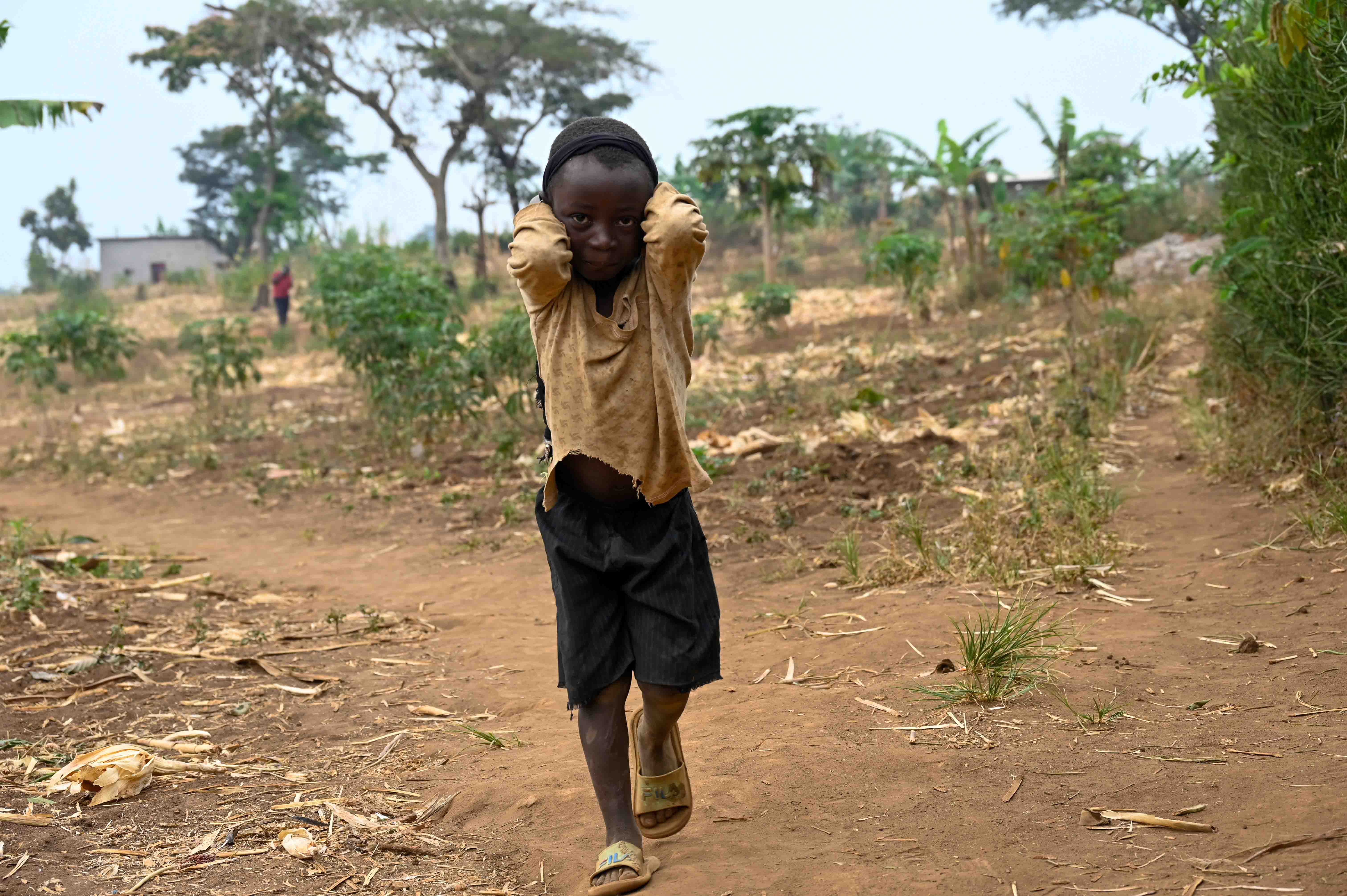 Ugandan child receiving World Vision support.