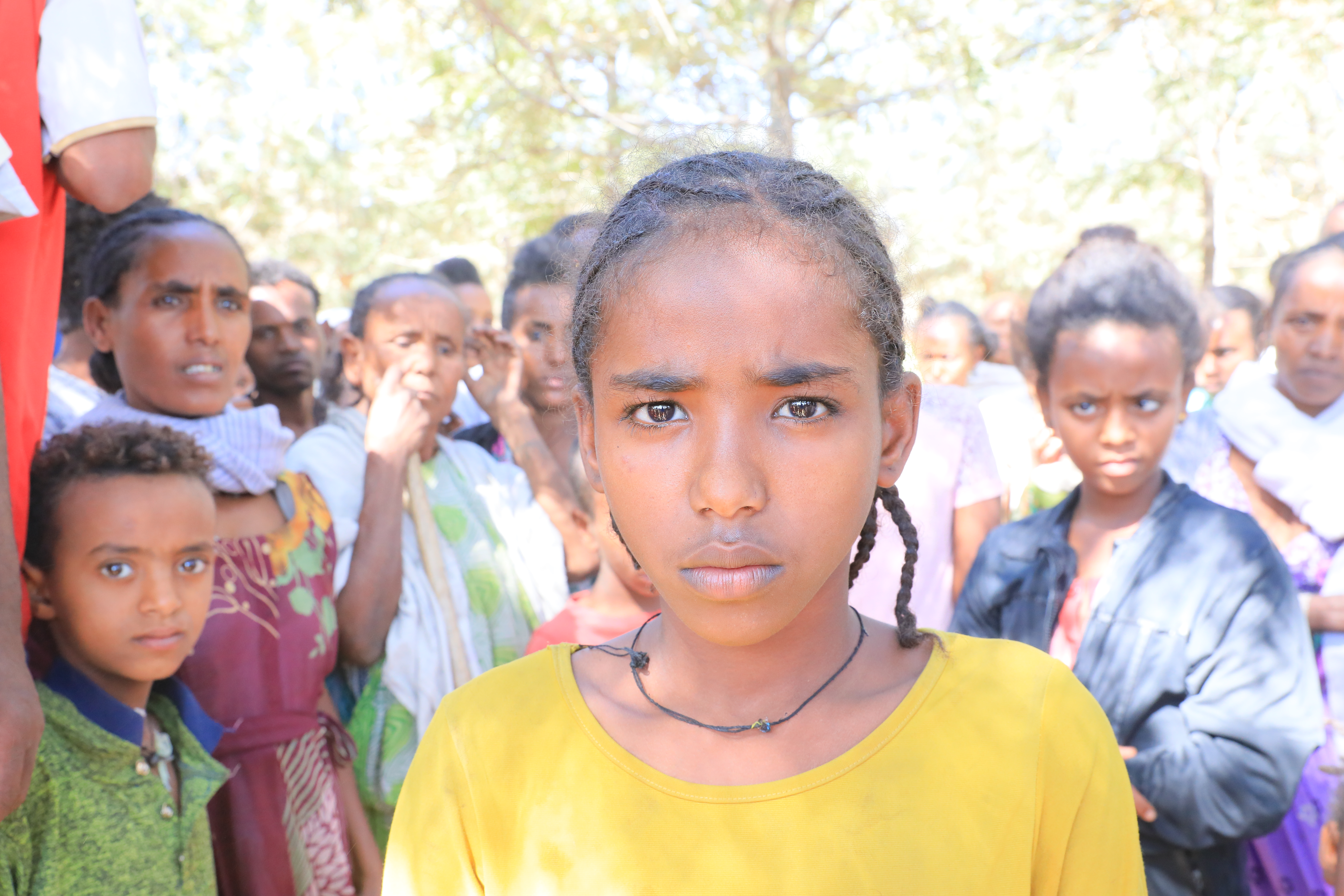 A group of girls from Ethiopia looking at the camera