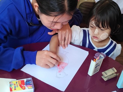Naw Win actively participates in an Early Childhood Education (ECE) activity