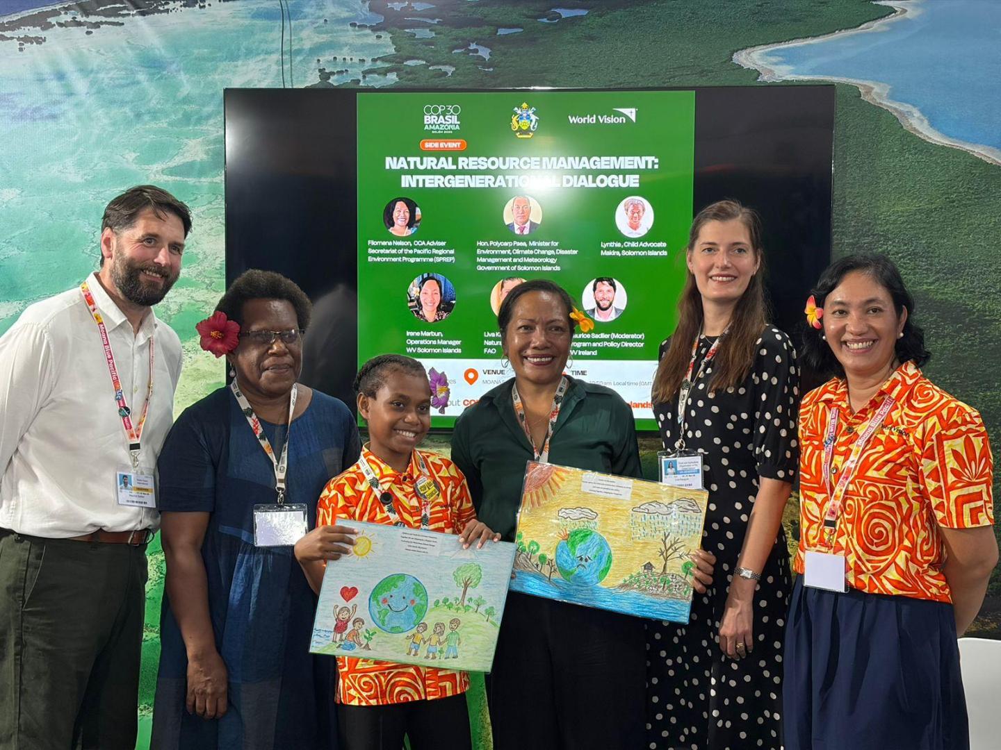 Lynthia with the World Vision delegation after a presentation at COP30