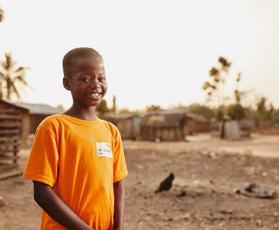 A boy smiling to the camera