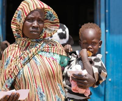 Mary holding her baby