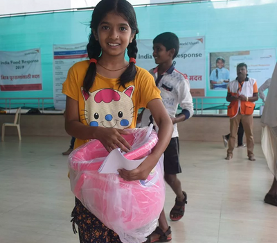 Girl holding a pink bucket