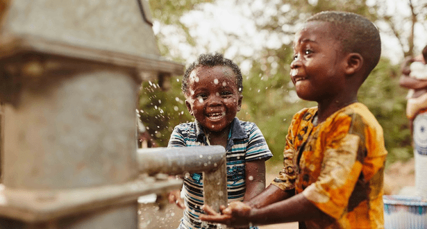 Children at a water tap