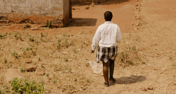 Brenda walking to school