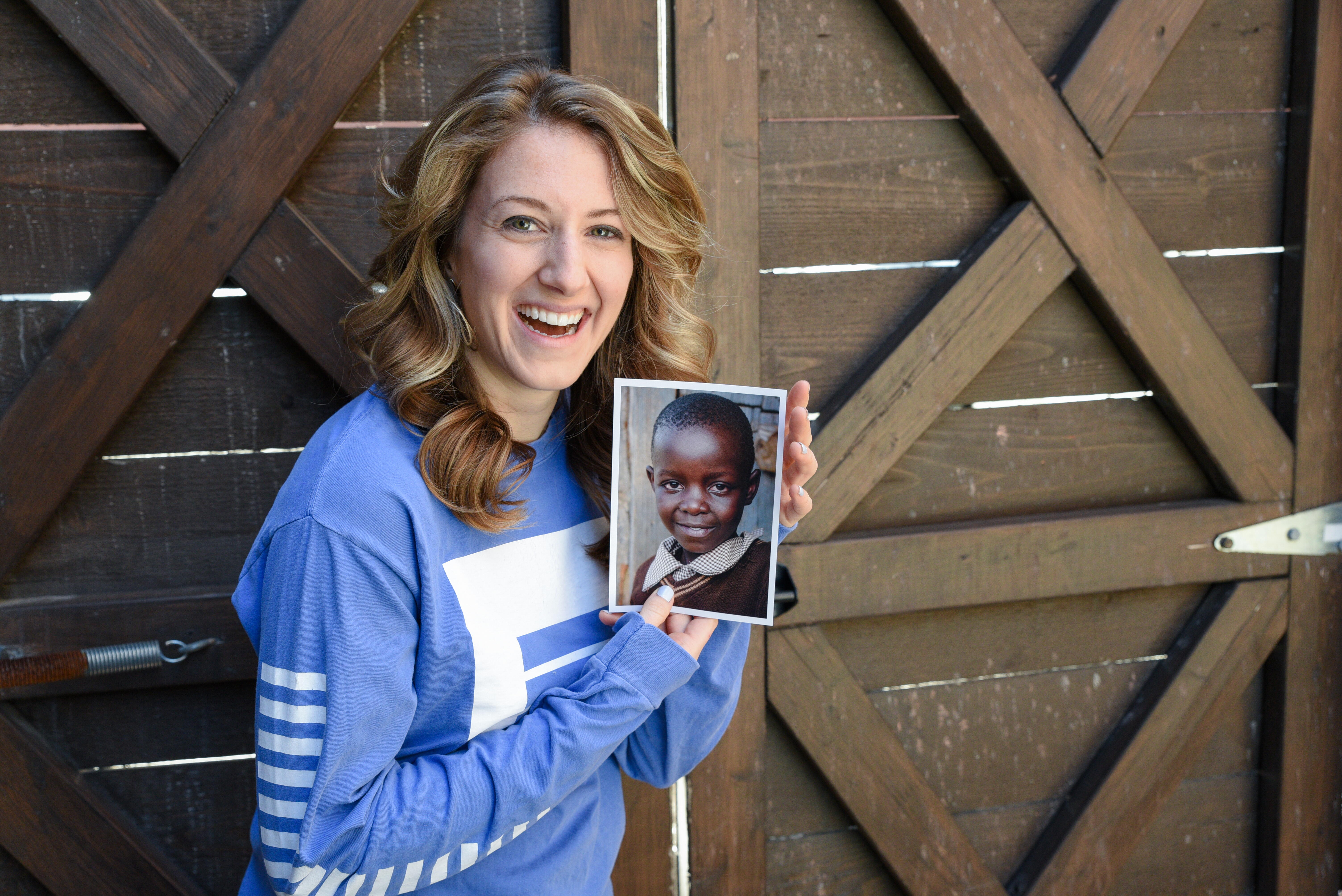 Amanda holding picture of Elizabeth
