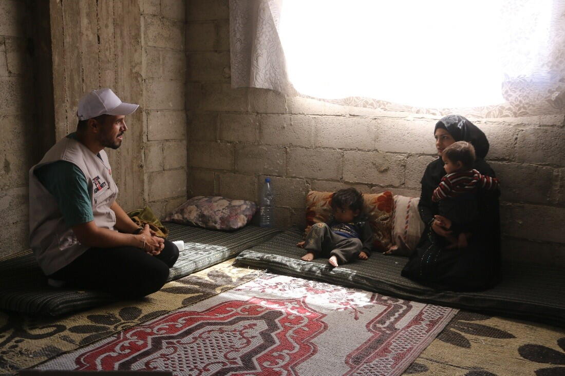 Iman* with her children during WVSR’s partner visit World Vision Syria Response partner, Action For Humanity