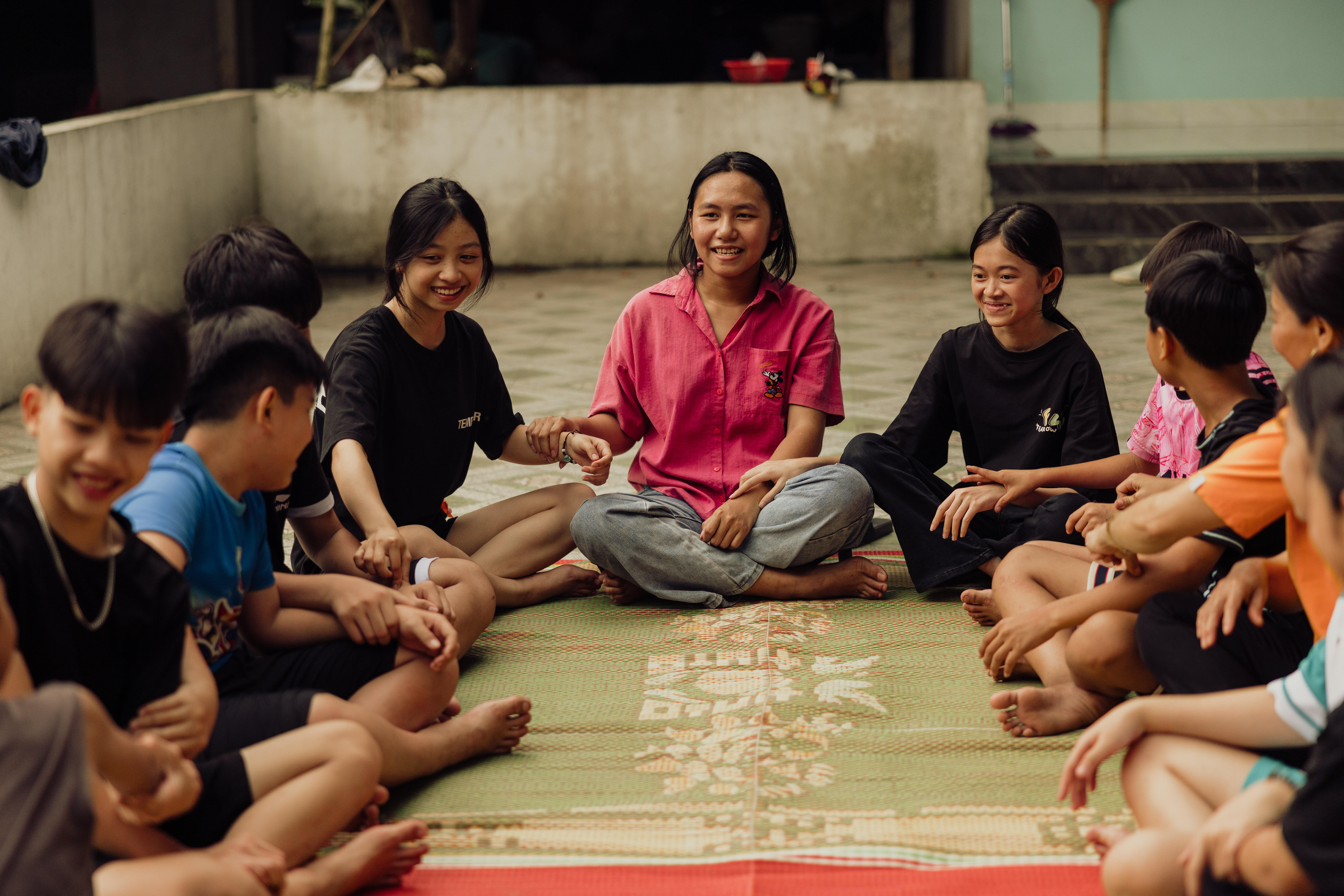 Group of girls sitting down