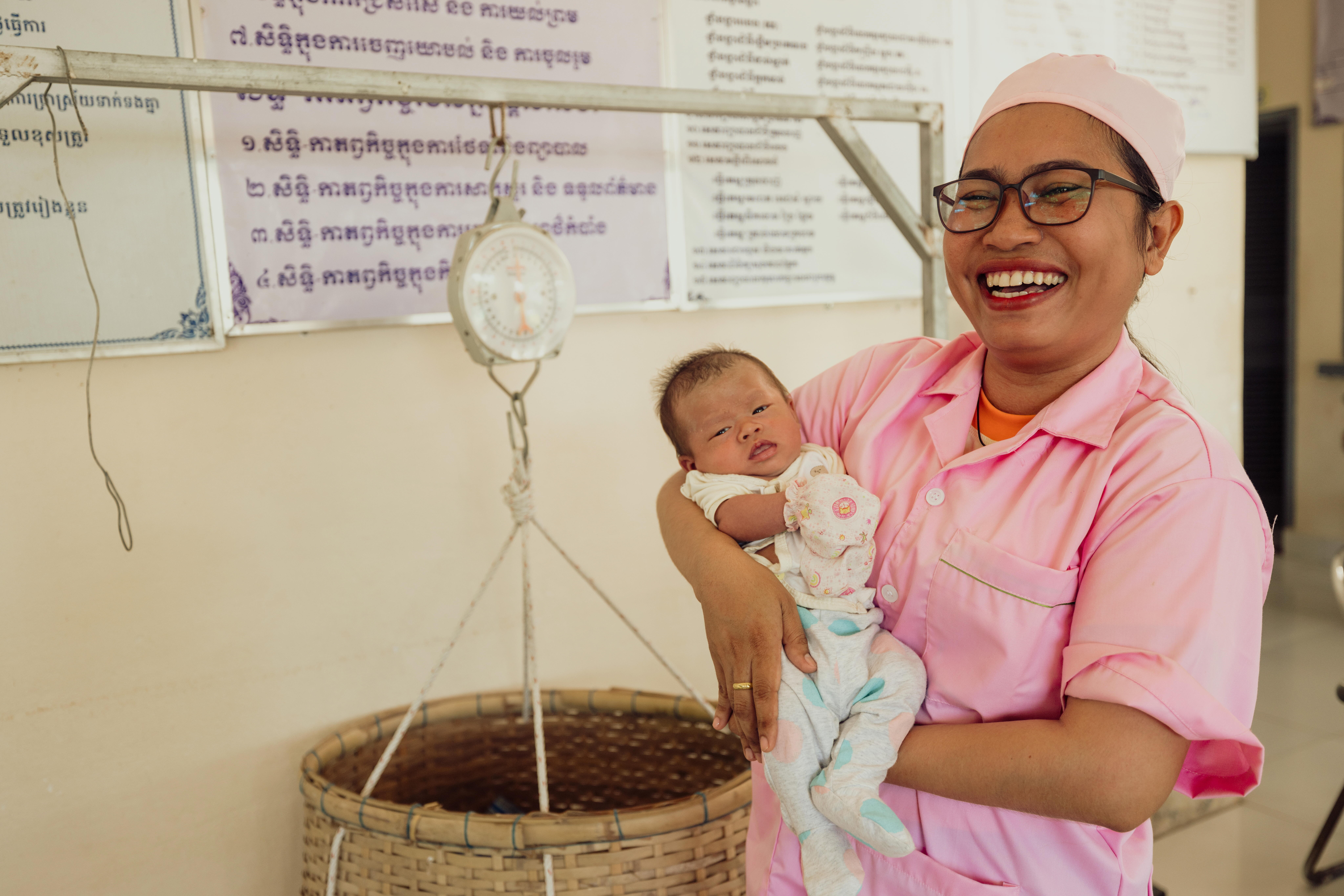 Vannak holding a baby