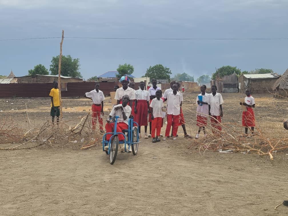 Child on his tricycle