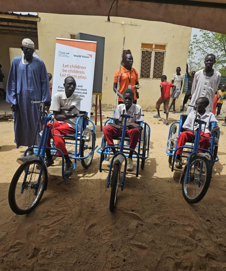 Monygau on his tricycle