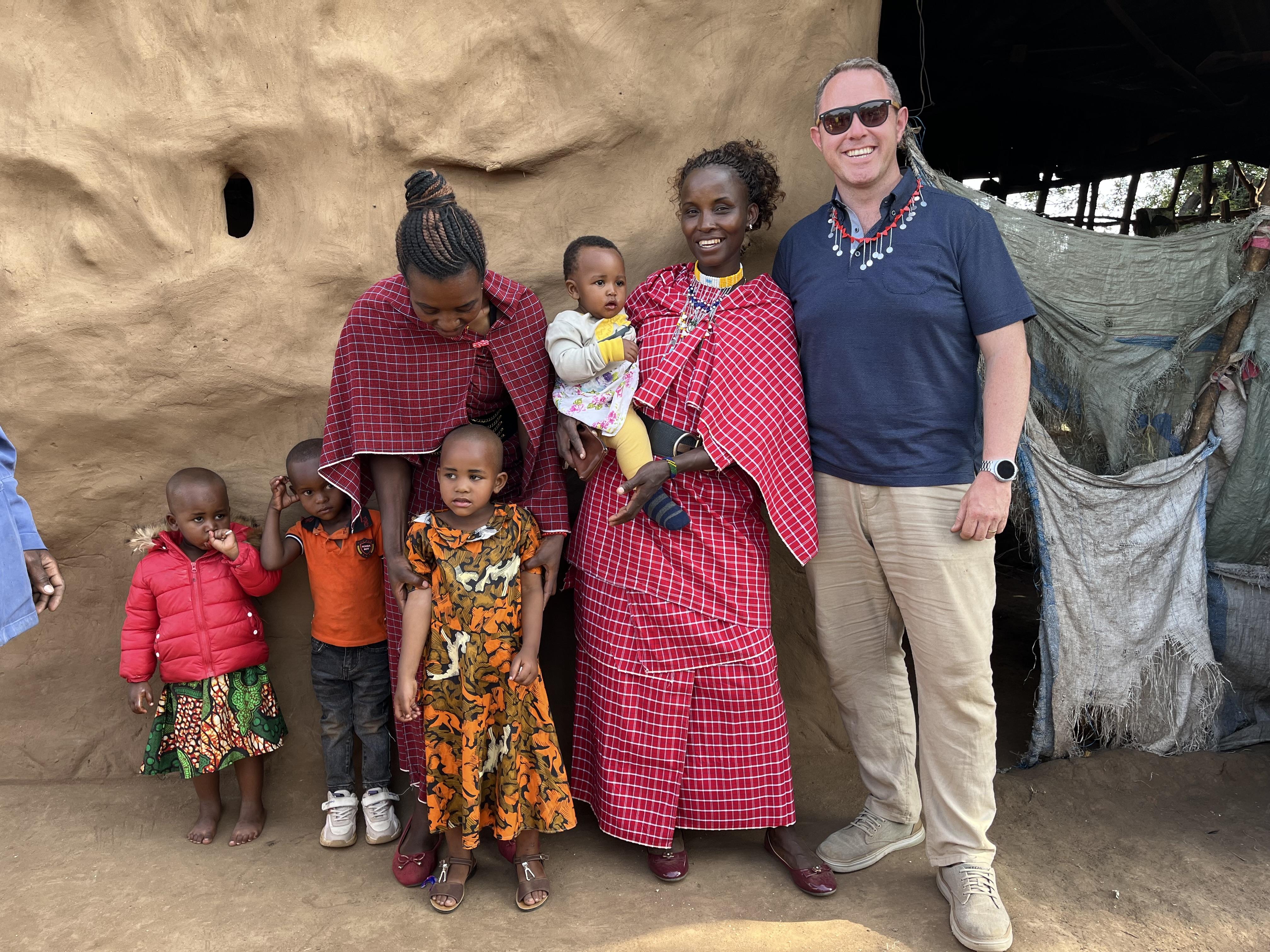 Paddy with Neema and her family