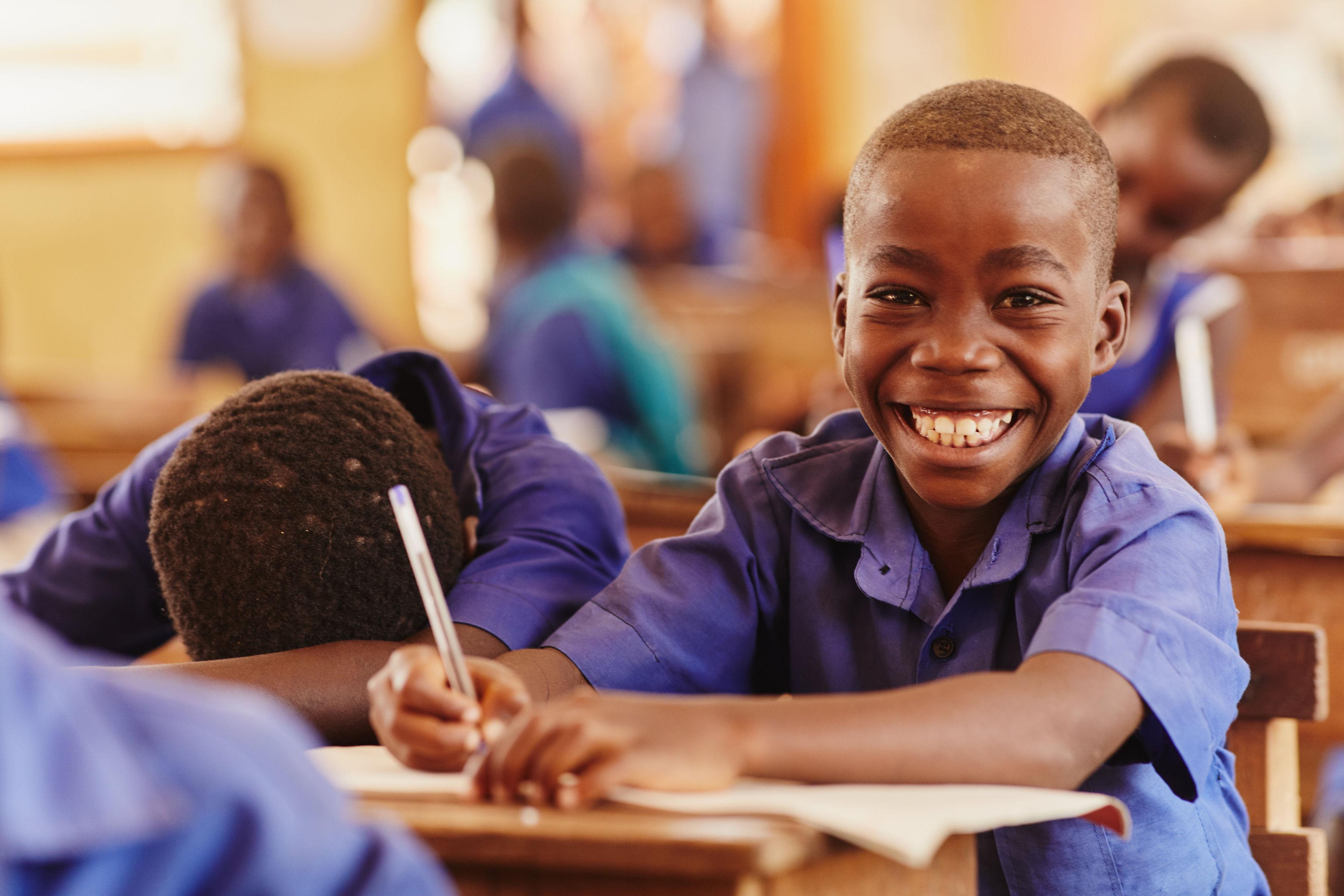 Smiling boy in class