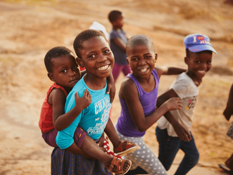 Children smiling mobile version