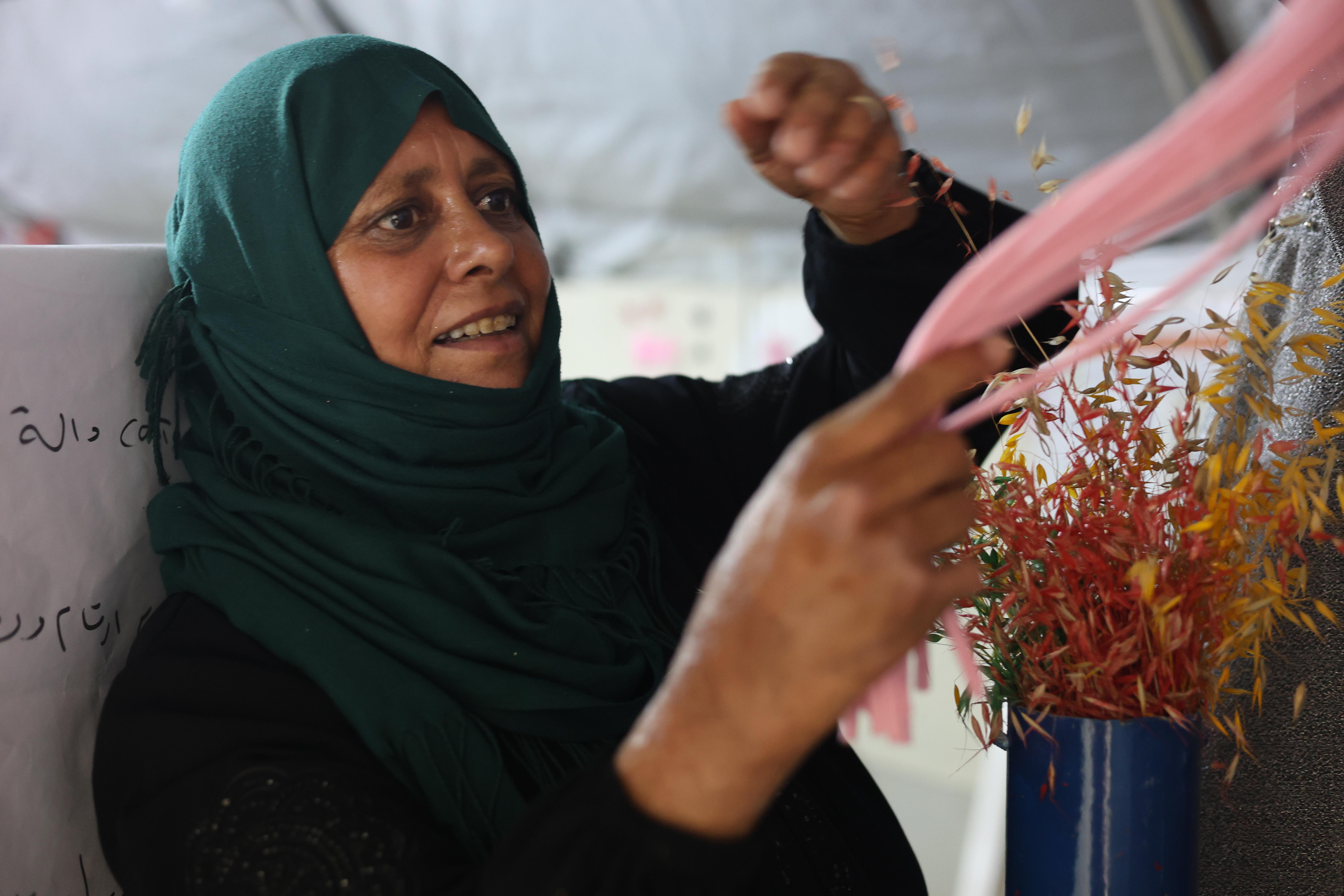 Maram* building her skills through WVSR vocational training. 