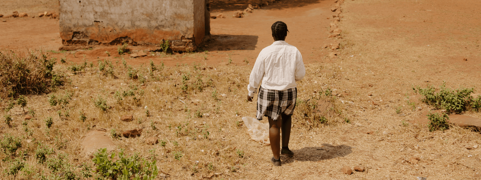 Brenda walking to school