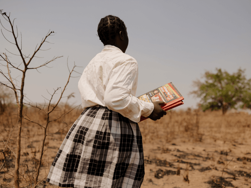 Brenda holding a book