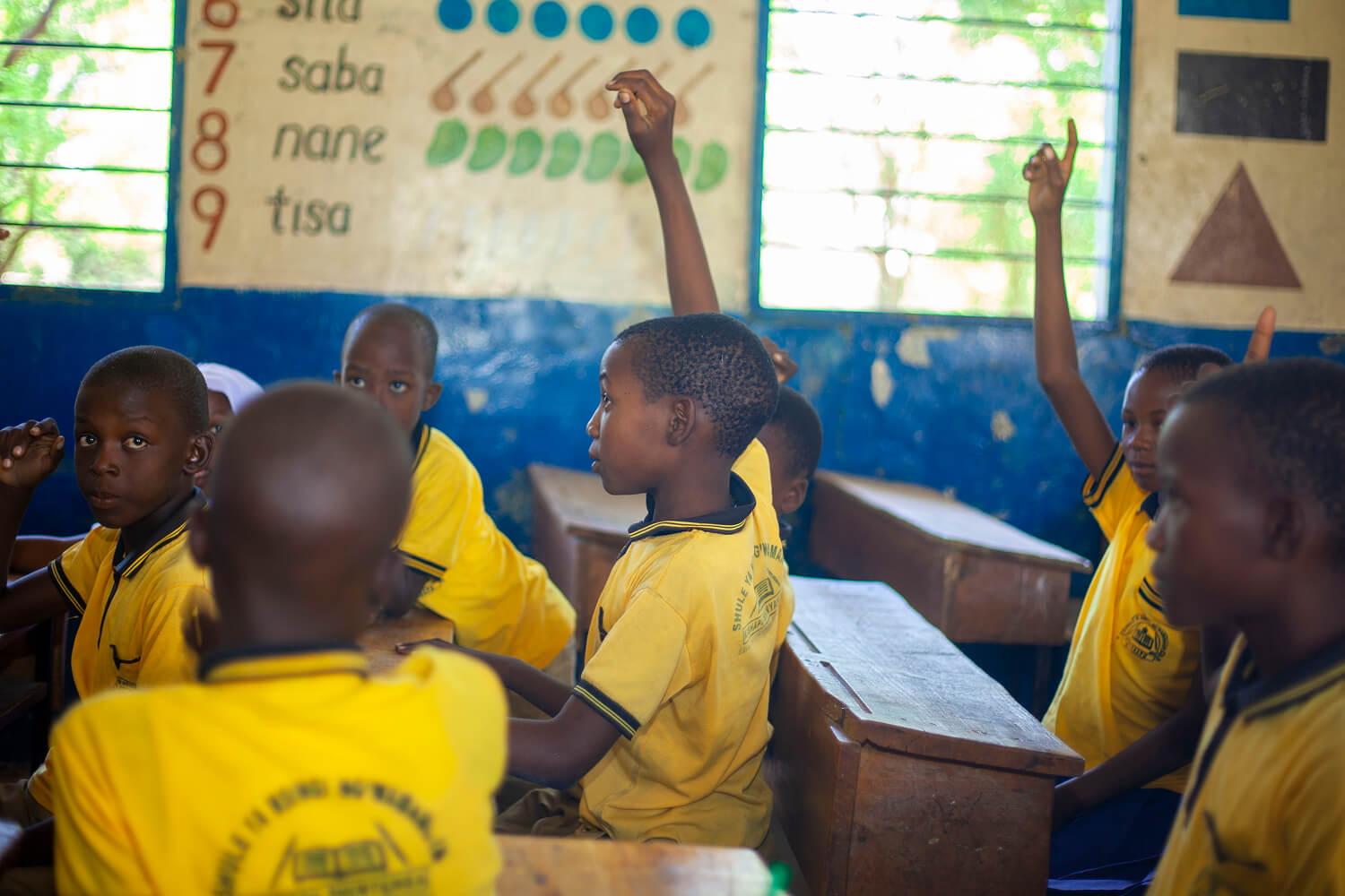 A member from the children’s focus group engaging in the climate risk and vulnerability assessment exercises in Tanzania.