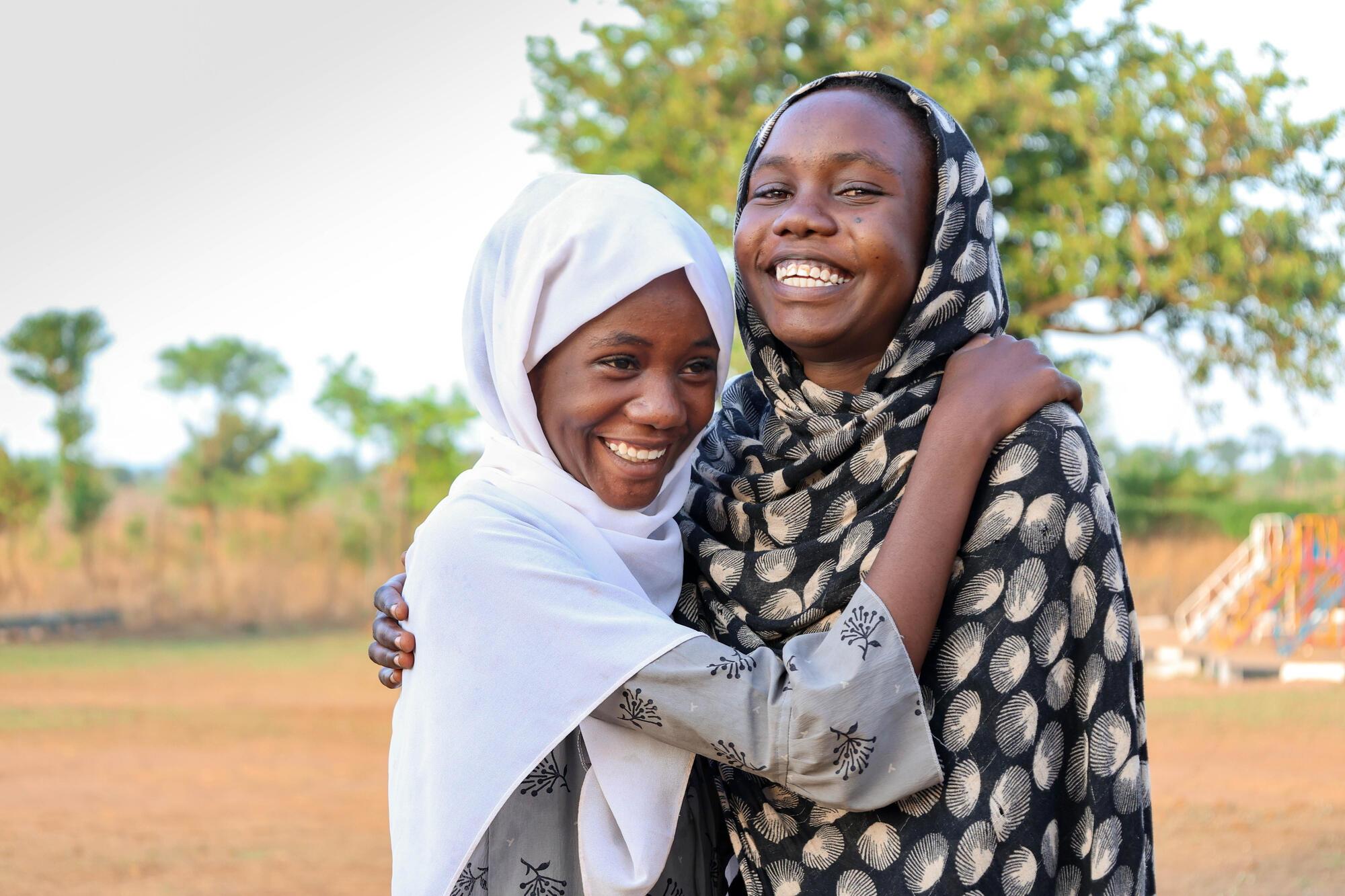 Sudanese refugees Fausl and her sister Asrar at a Reception centre in Uganda.