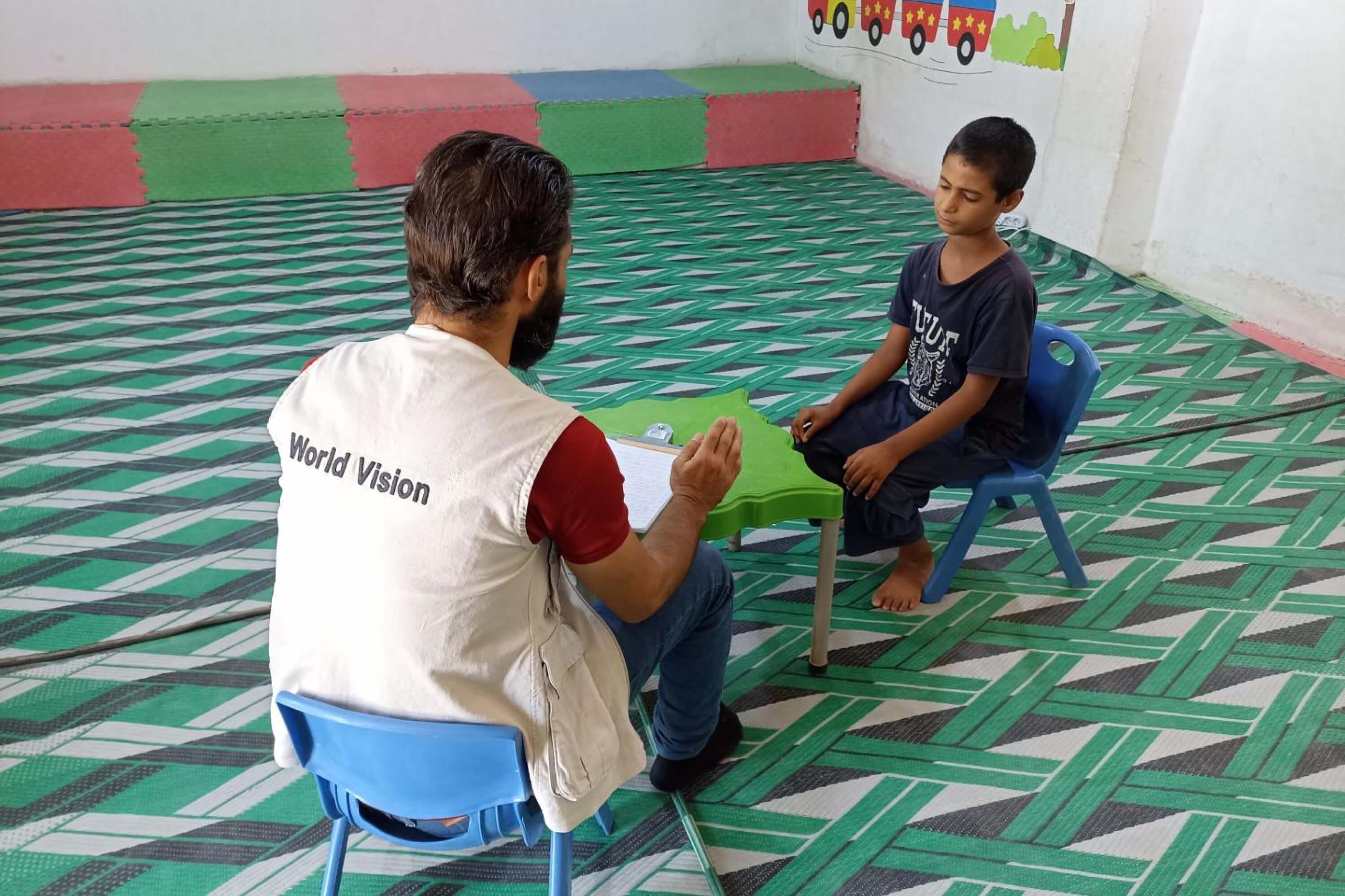 Mahmoud* during one of the sessions with the facilitator